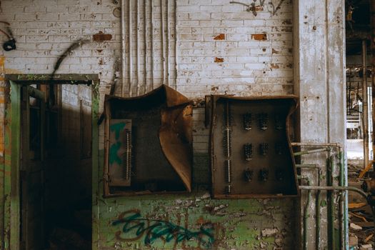 Explore the decayed charm of an abandoned industrial building with rusted elements and history.