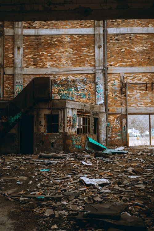 Free Discover the rustic charm of urban exploration in this abandoned building with graffiti. Stock Photo