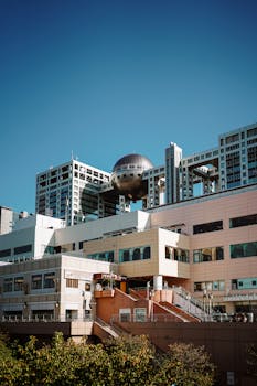 View of futuristic architecture in Odaiba, Tokyo with distinctive spherical structure.