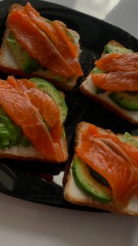 Appetizing smoked salmon and avocado on toast, perfect for brunch.
