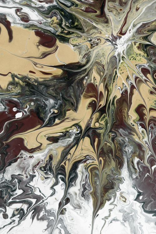 Free A stunning fluid art piece displaying swirling earthy colors for a modern artistic touch. Stock Photo