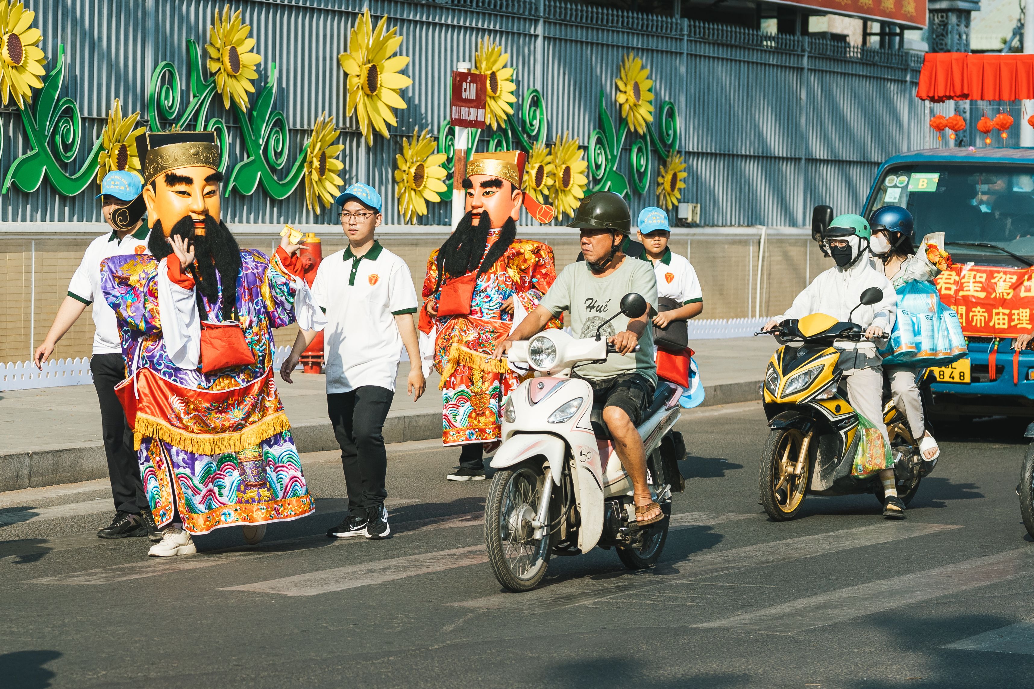 Colorful Festival Parade with Costumed Figures · Free Stock Photo