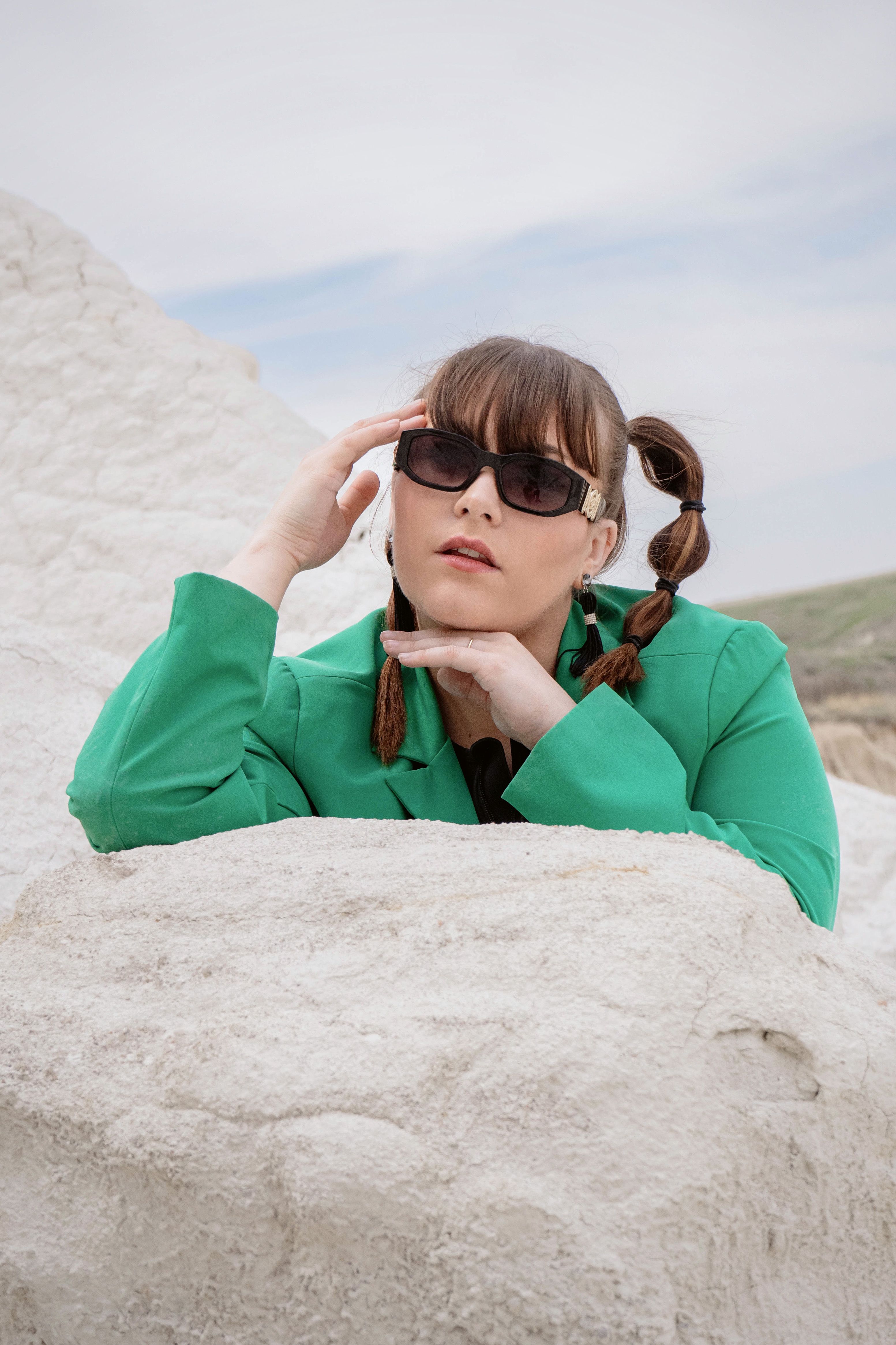 Stylish Portrait of Woman in Green Jacket Outdoors · Free Stock Photo