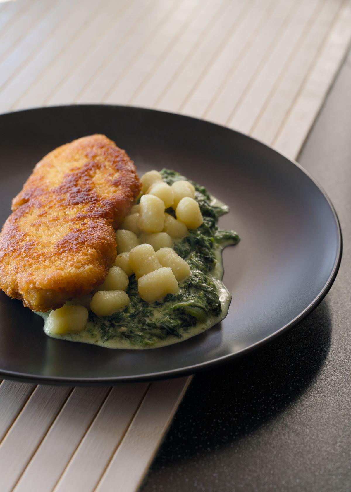 Golden chicken breast in a creamy spinach sauce — the classic Florentine plate