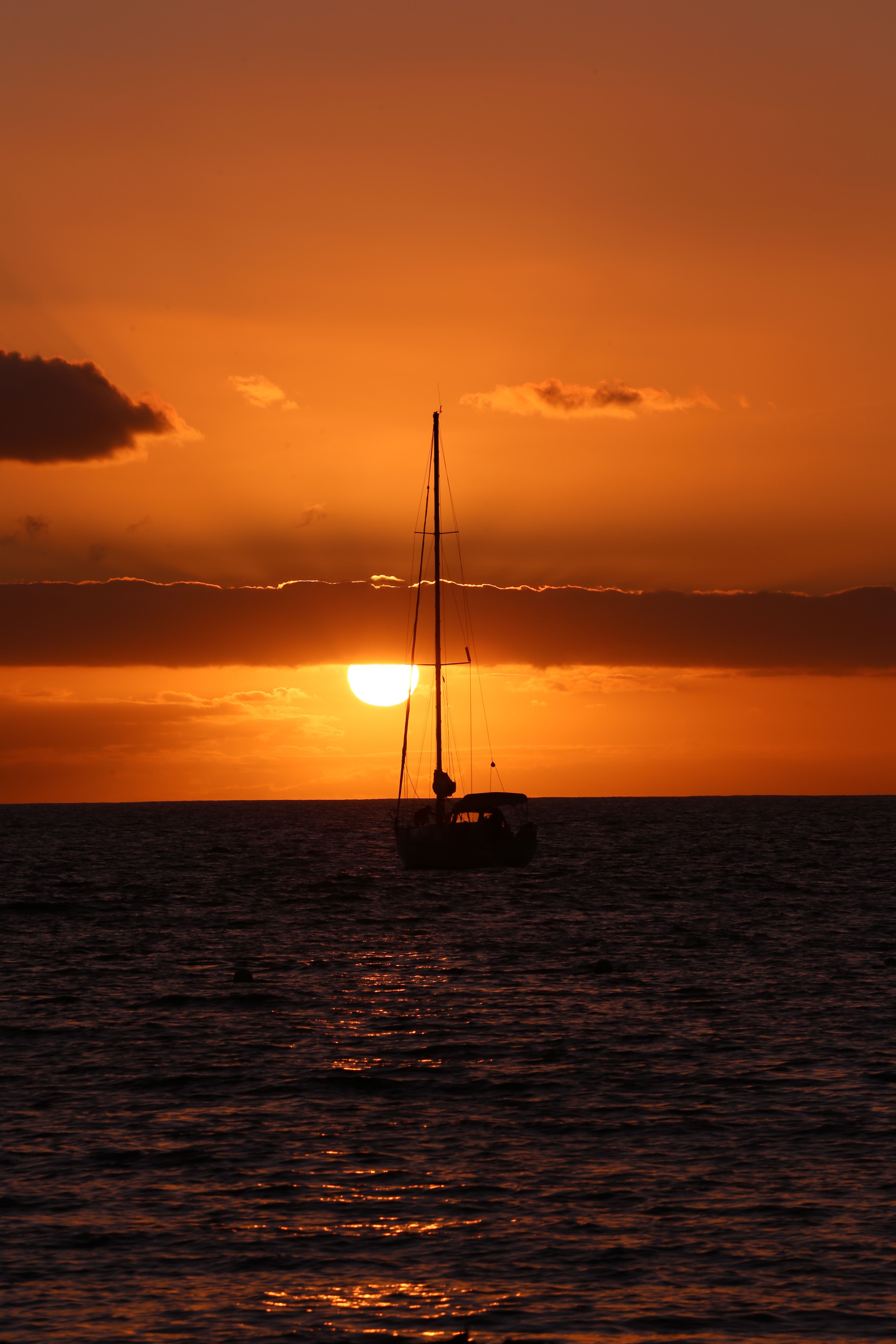 Sailboat on Body of Water during Sunset · Free Stock Photo