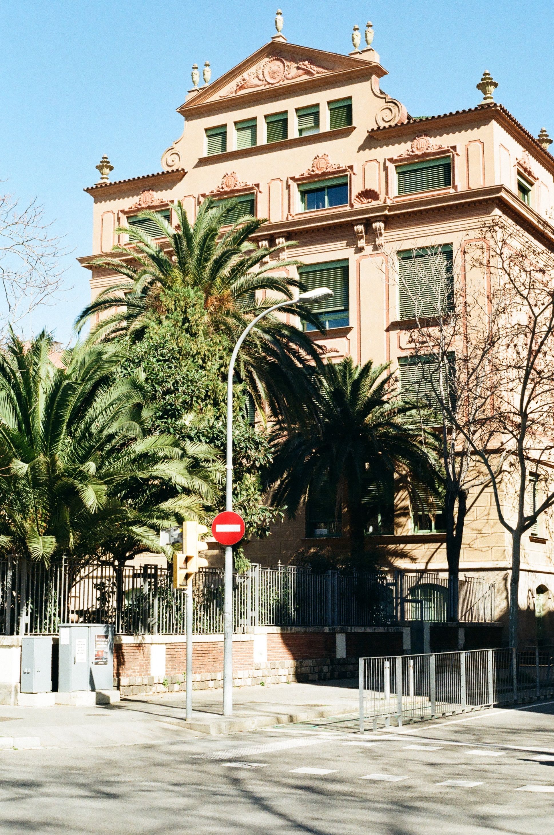 Historic Barcelona Building Under Blue Sky · Free Stock Photo