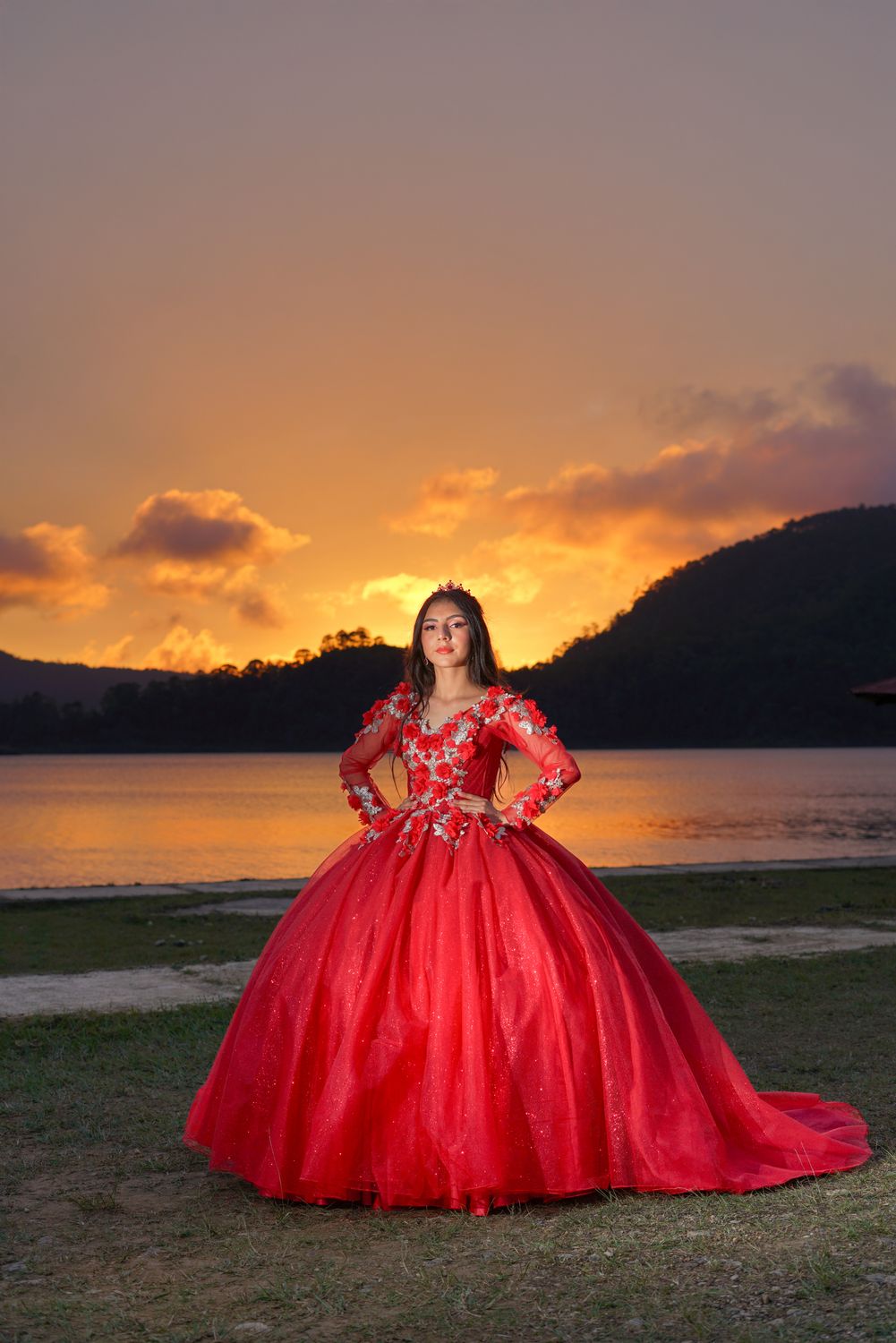 Elegant Woman in Red Gown at Sunset · Free Stock Photo