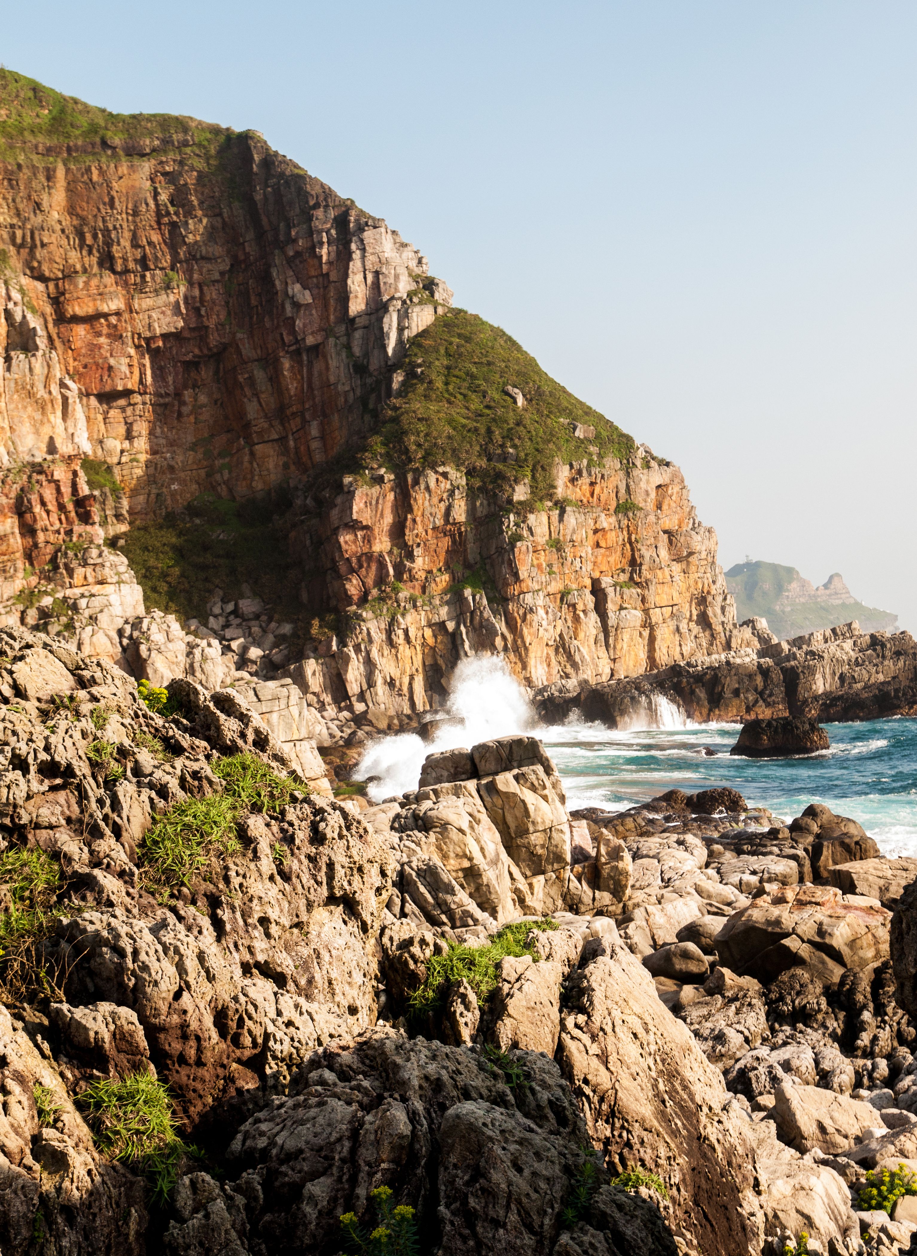 Scenic Coastal Cliffs with Erosion Patterns · Free Stock Photo