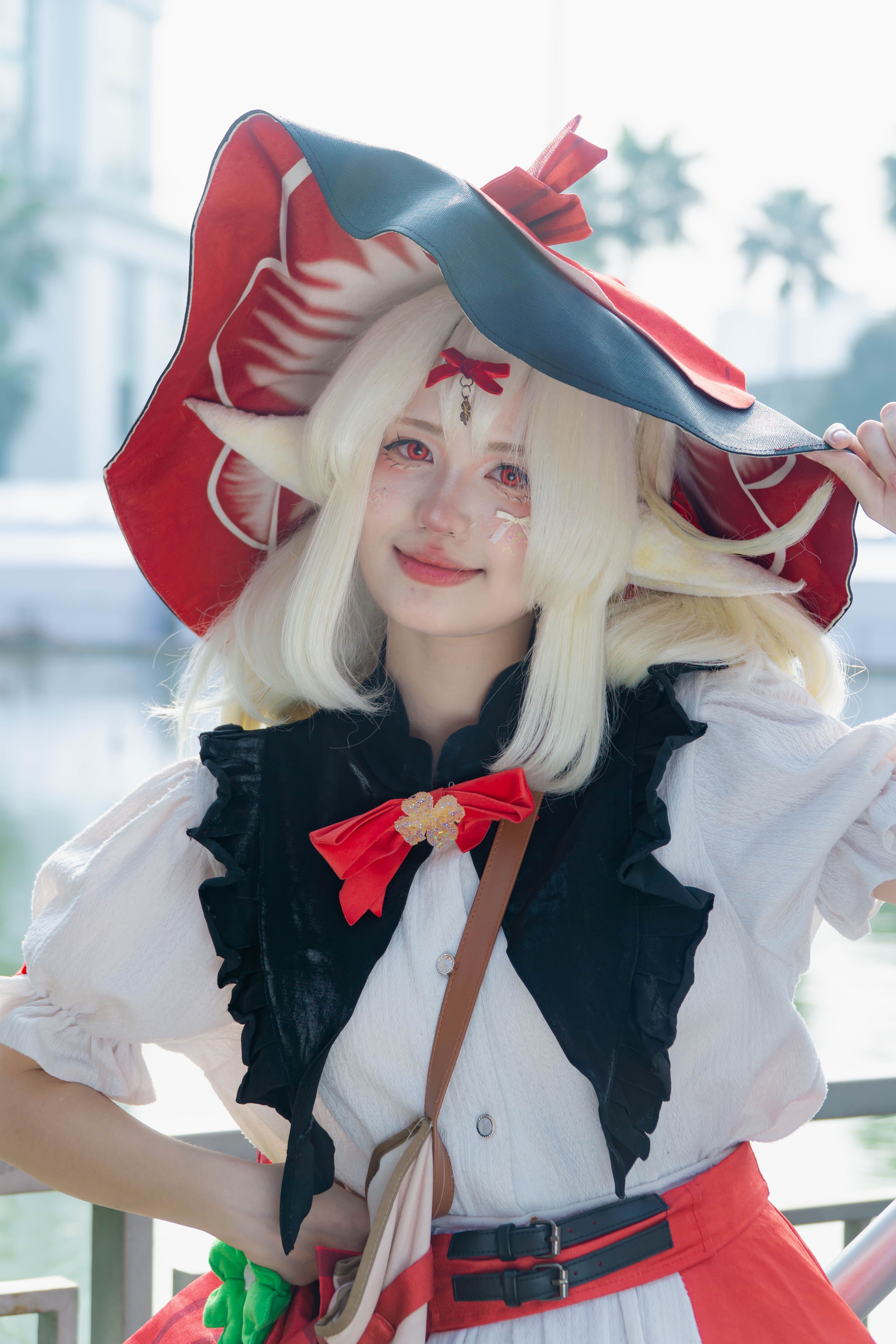 Vibrant Cosplay Portrait with Red Hat