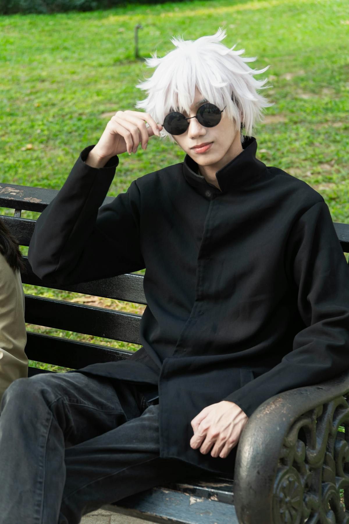 Beautiful snake coiled on mossy rock in forest