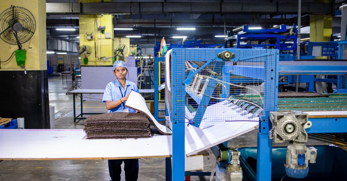 Female Textile Worker in a Modern Factory · Free Stock Photo
