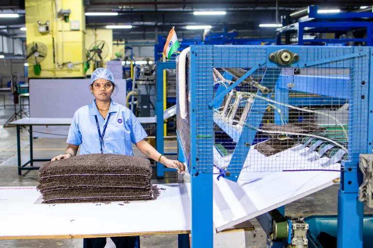 Worker inside a modern textile manufacturing facility