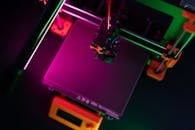 3D Printer in Neon Lights from Above