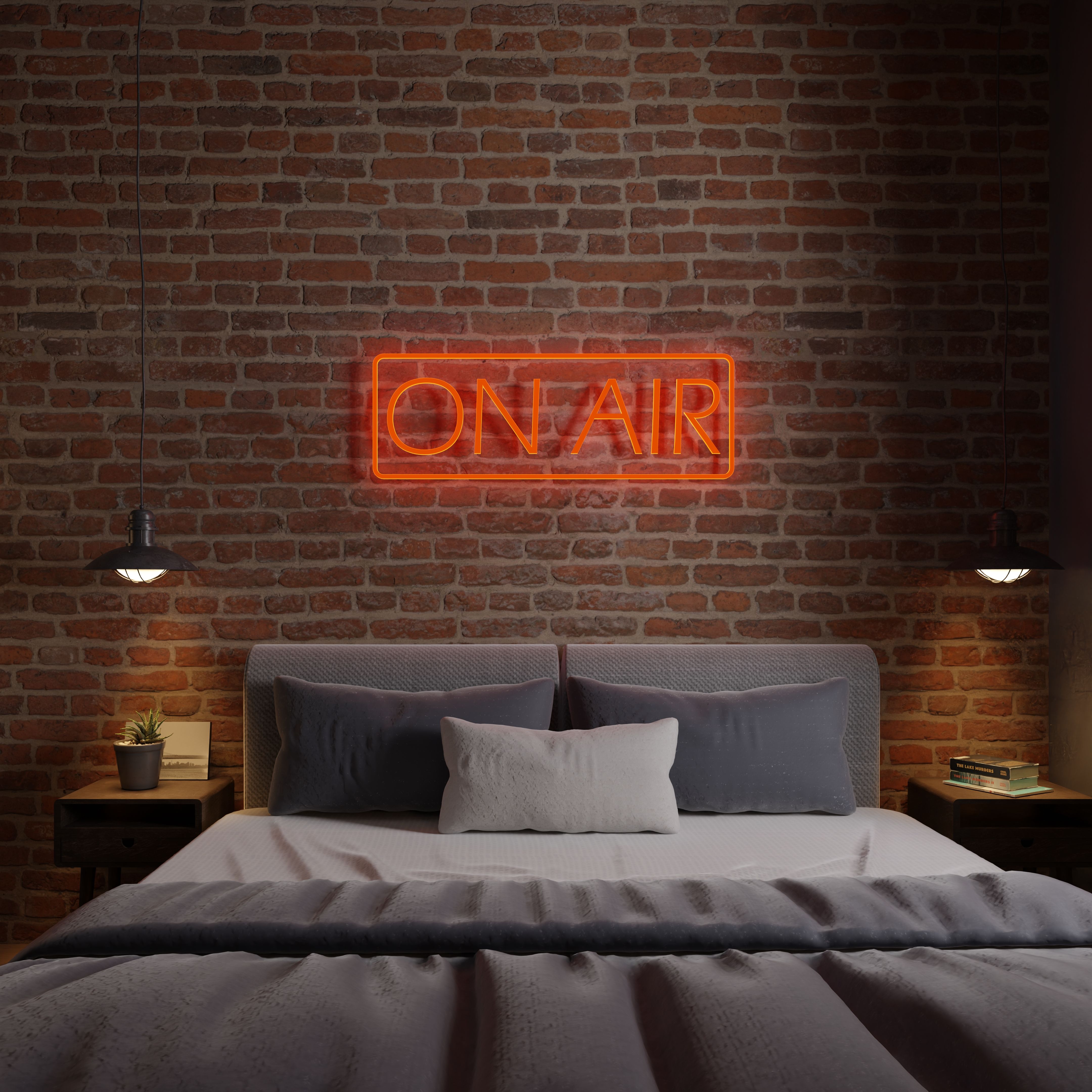 Modern bedroom with brick wall and neon 'ON AIR' sign above bed, creating a cozy atmosphere.