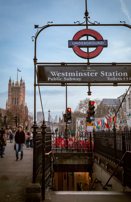 Free View of Westminster Station entrance with iconic signage in London, UK. Stock Photo