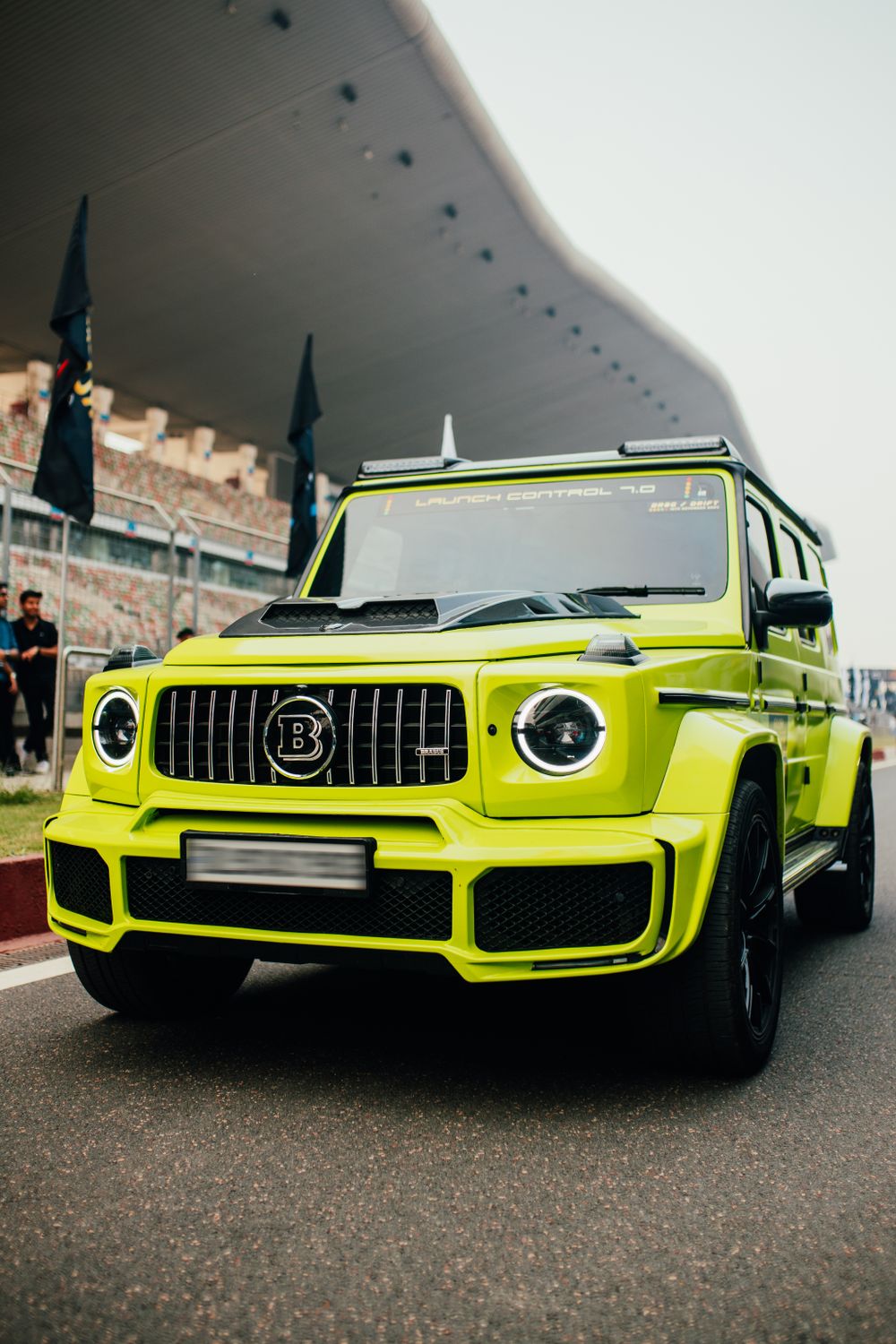 G63 Racing Vibrant Mercedes G63 at Greater Noida Race Track · Free Stock Photo