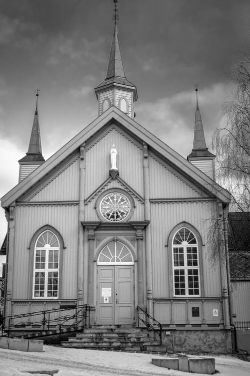 Free Black and white photo of a historic wooden church in Tromsø, Troms, Norway. Stock Photo
