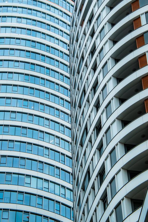 Free A close-up view of a modern curved building facade in Belgrade, Serbia. Stock Photo