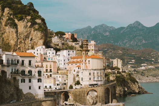 Scenic landscape of Amalfi Coast with colorful cliffside houses.