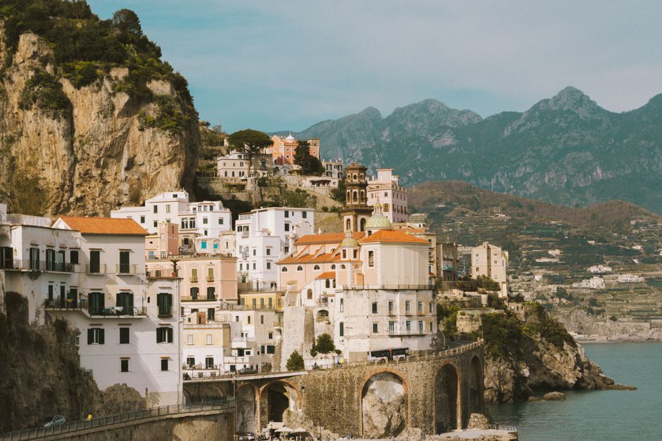 Scenic landscape of Amalfi Coast with colorful cliffside houses.