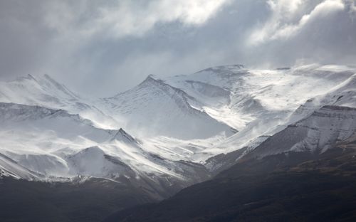 Free Stunning snow-covered mountain peaks in Argentina, captured in a winter landscape scene. Stock Photo