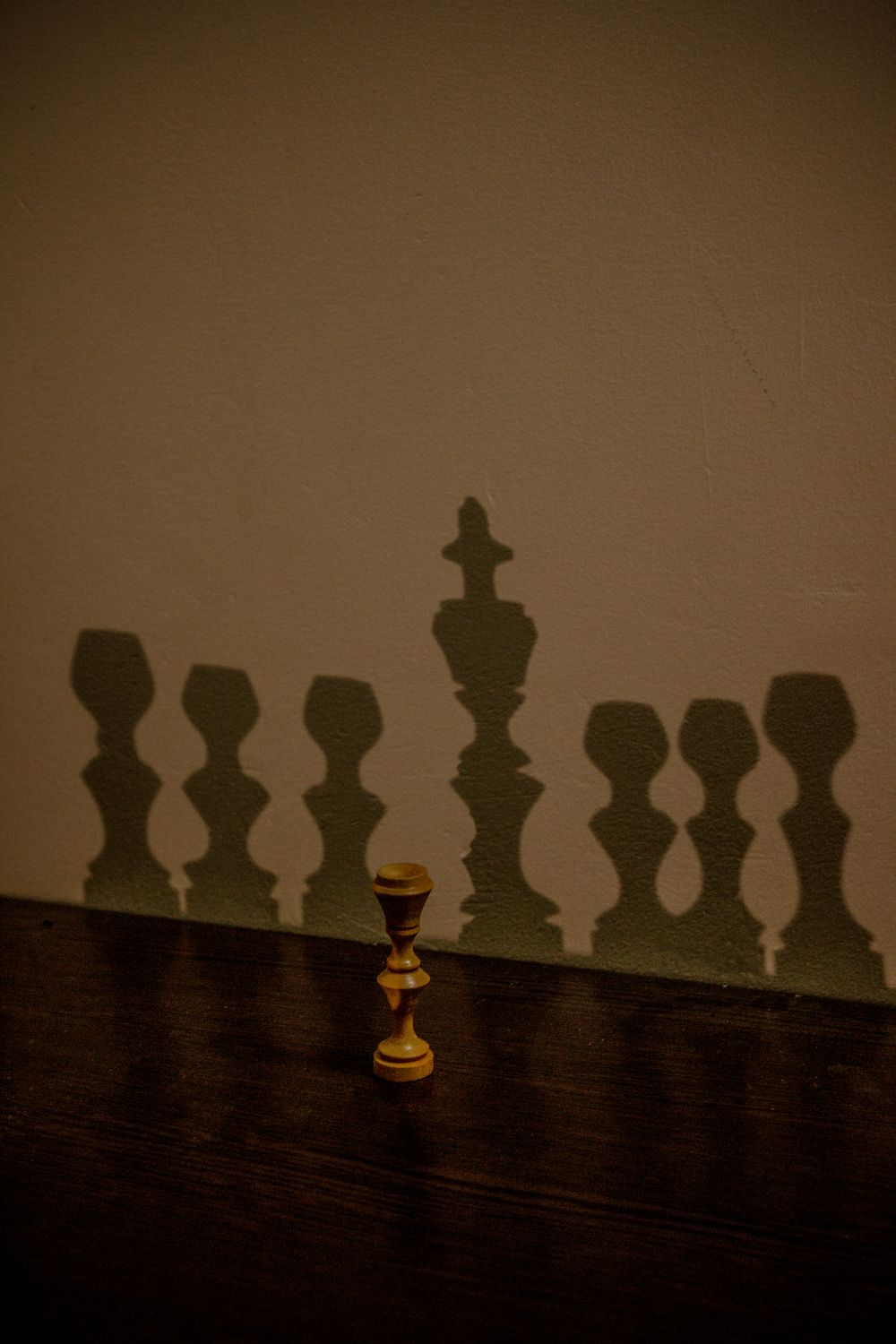 Chess Rook Shadow Artistic Chess Shadows on Wooden Surface · Free Stock Photo