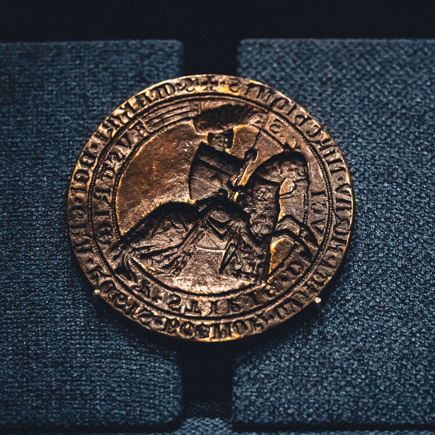 Close-up of an old metal coin, photo by Blackcurrant Great on Pexels
