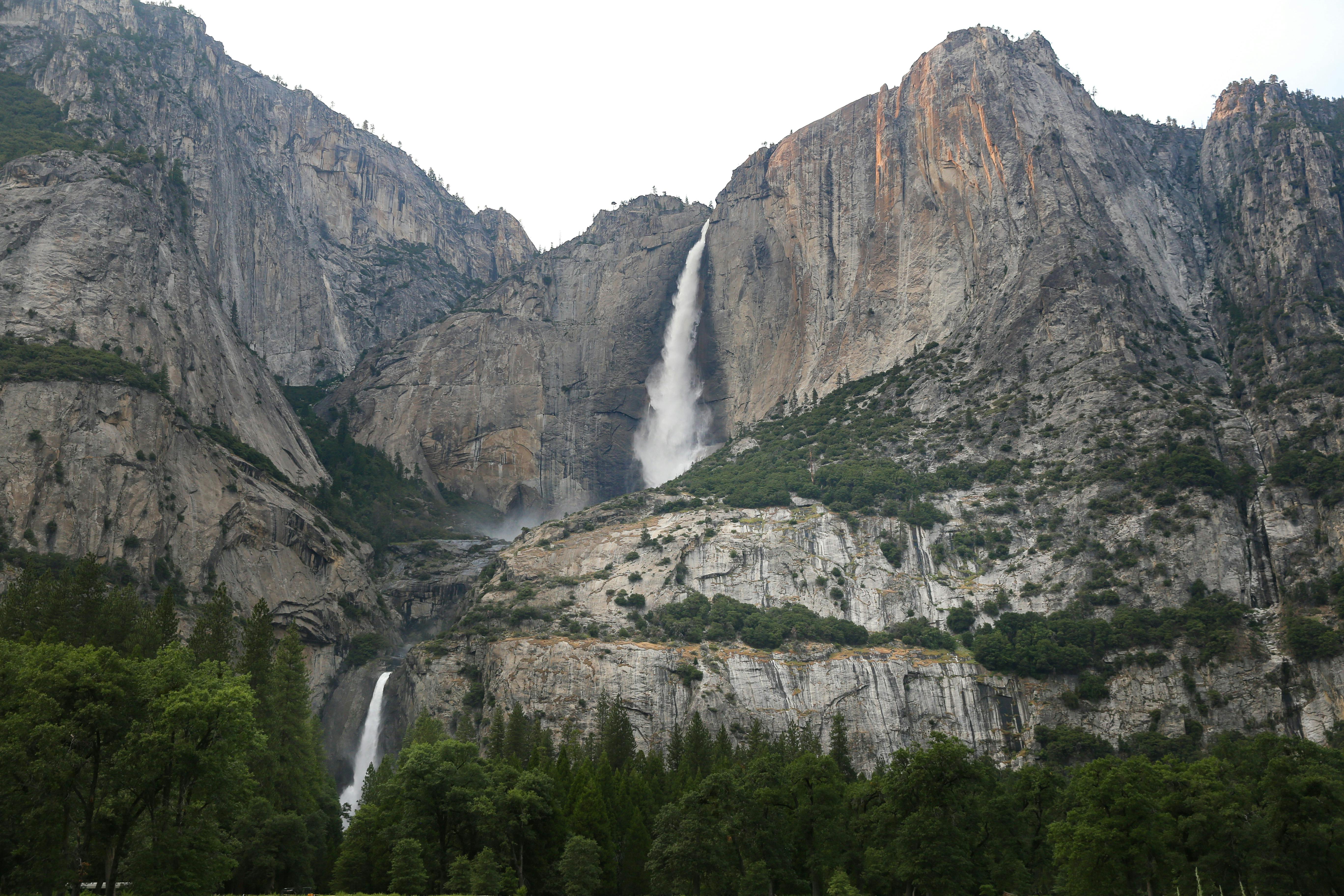 Yosemite Falls cascades down the rugged cliffs of Yosemite National Park, a breathtaking natural wonder in California.