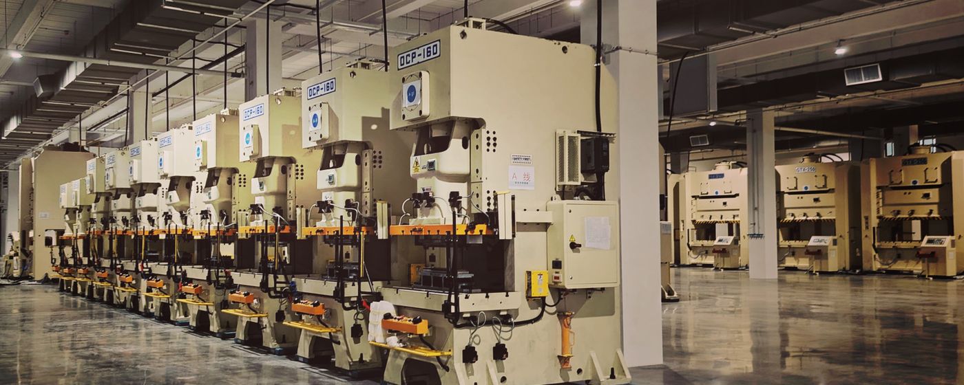 Industrial factory floor with rows of manufacturing machinery