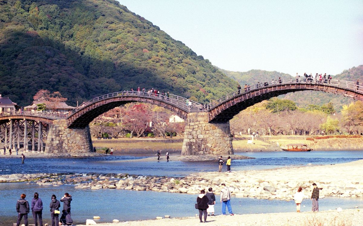 The wooden arches of Kintai Bridge spanning the Nishiki River in Iwakuni