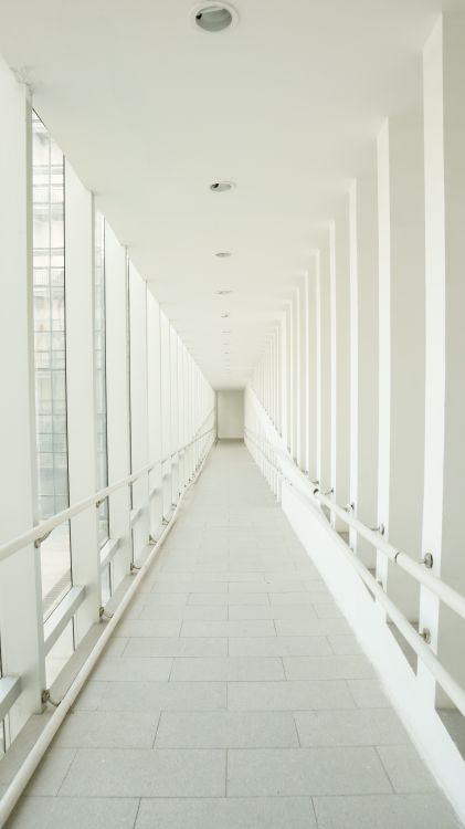 Long Modern White Corridor with Railings · Free Stock Photo