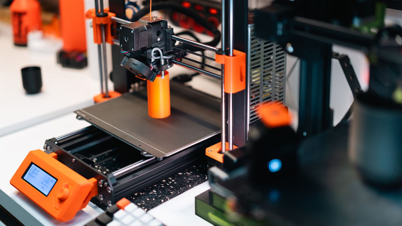 3D printer building a functional prototype part