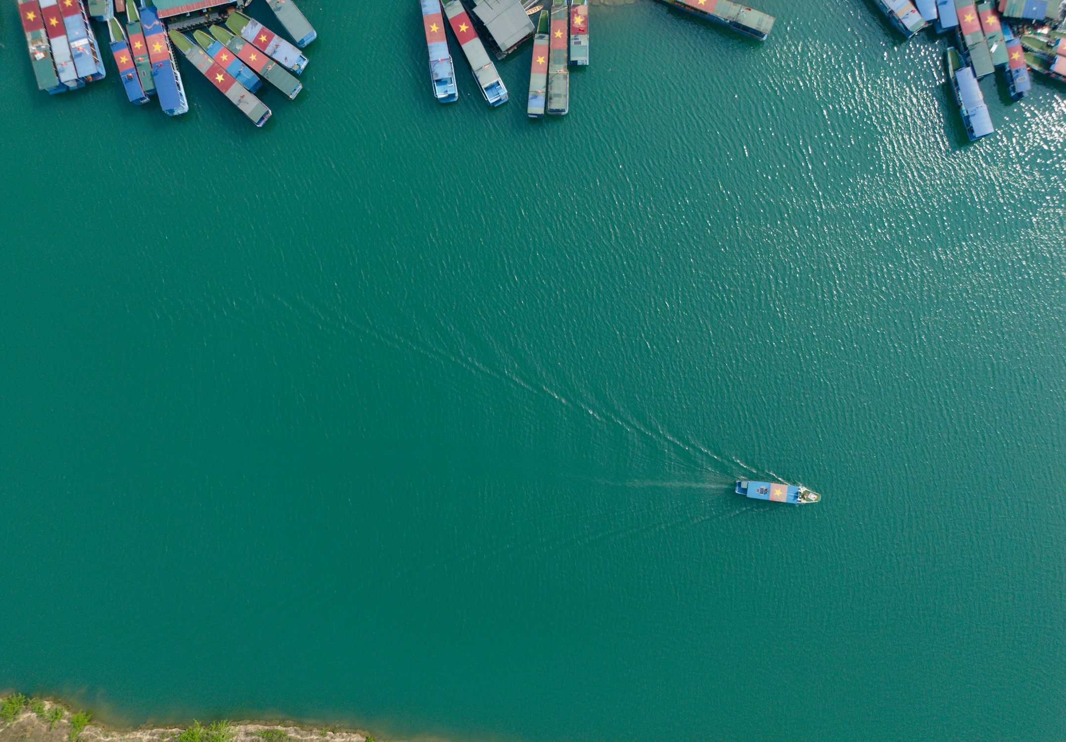 Aerial View of Boats on Calm Turquoise Water · Free Stock Photo