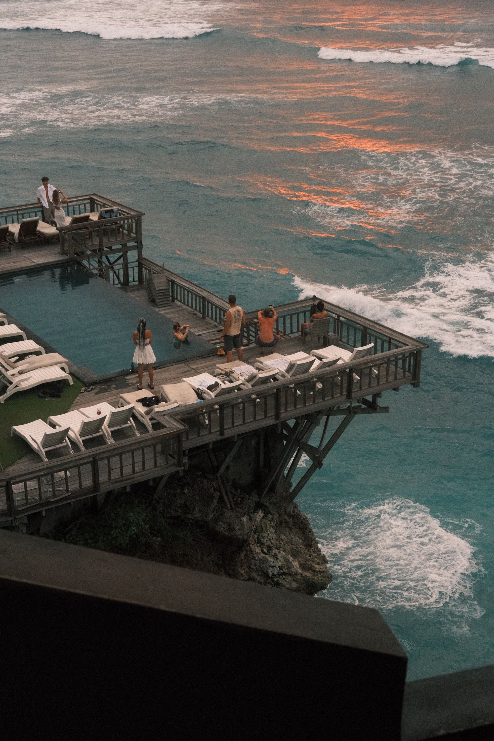 Coastal cliffside pool with ocean horizon view representing Pacific coastal living in Baja California