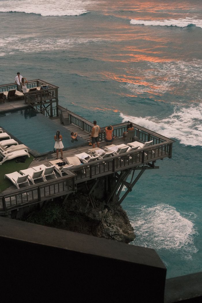 Cliffside infinity pool at sunset, Bali