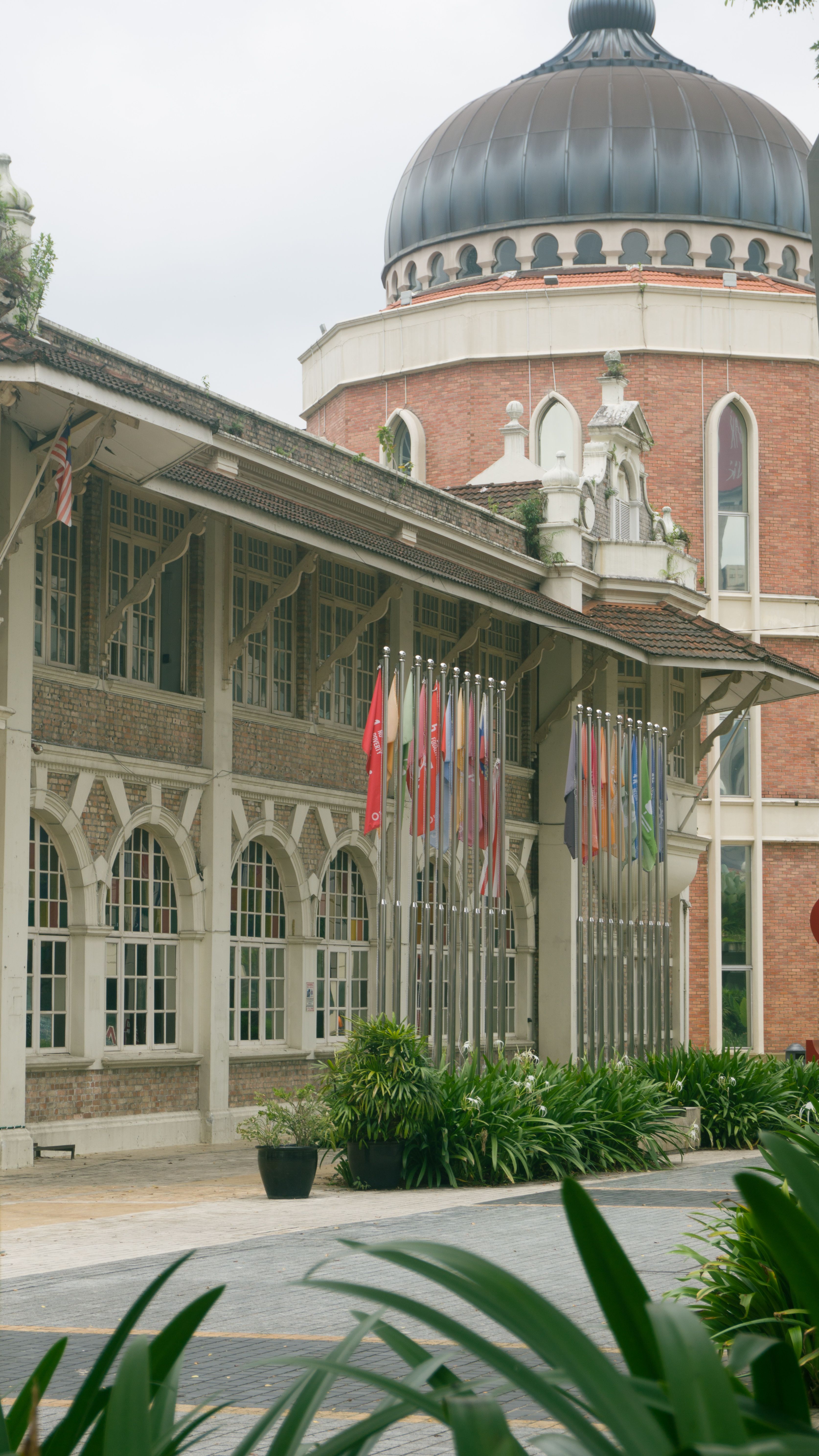 Colonial Architecture with Flags Display · Free Stock Photo
