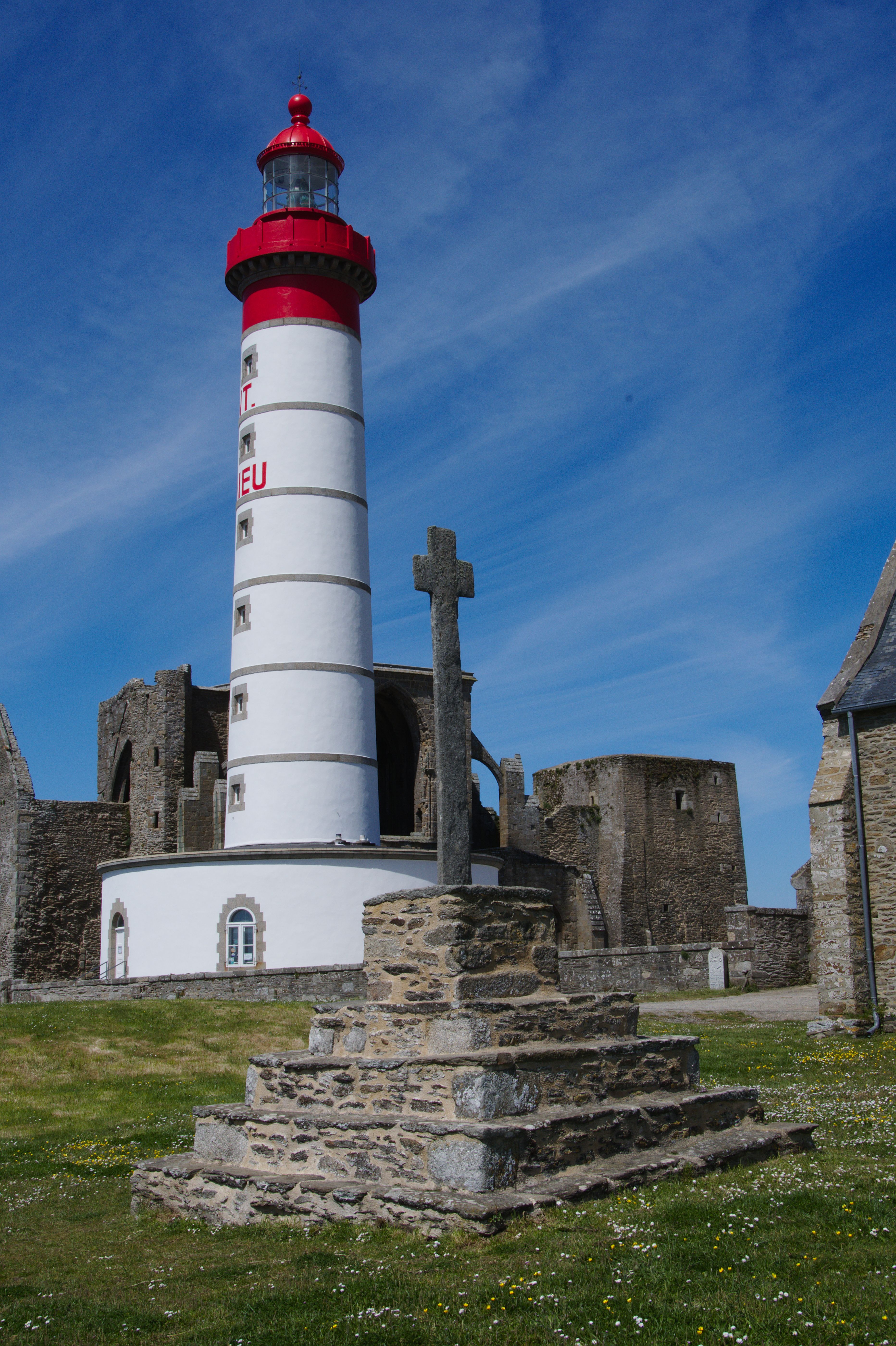 Vibrant view of the Saint-Mathieu Lighthouse against a blue sky.