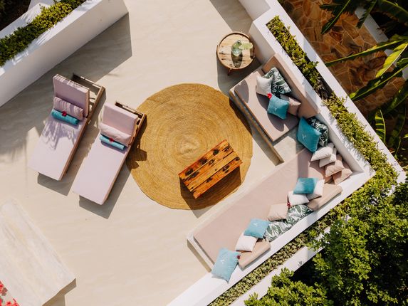 Aerial view of a luxurious outdoor lounge space at a Zanzibar resort, perfect for summer relaxation. Related image for Hospitality in Africa: What Comes Next for Modern Properties.