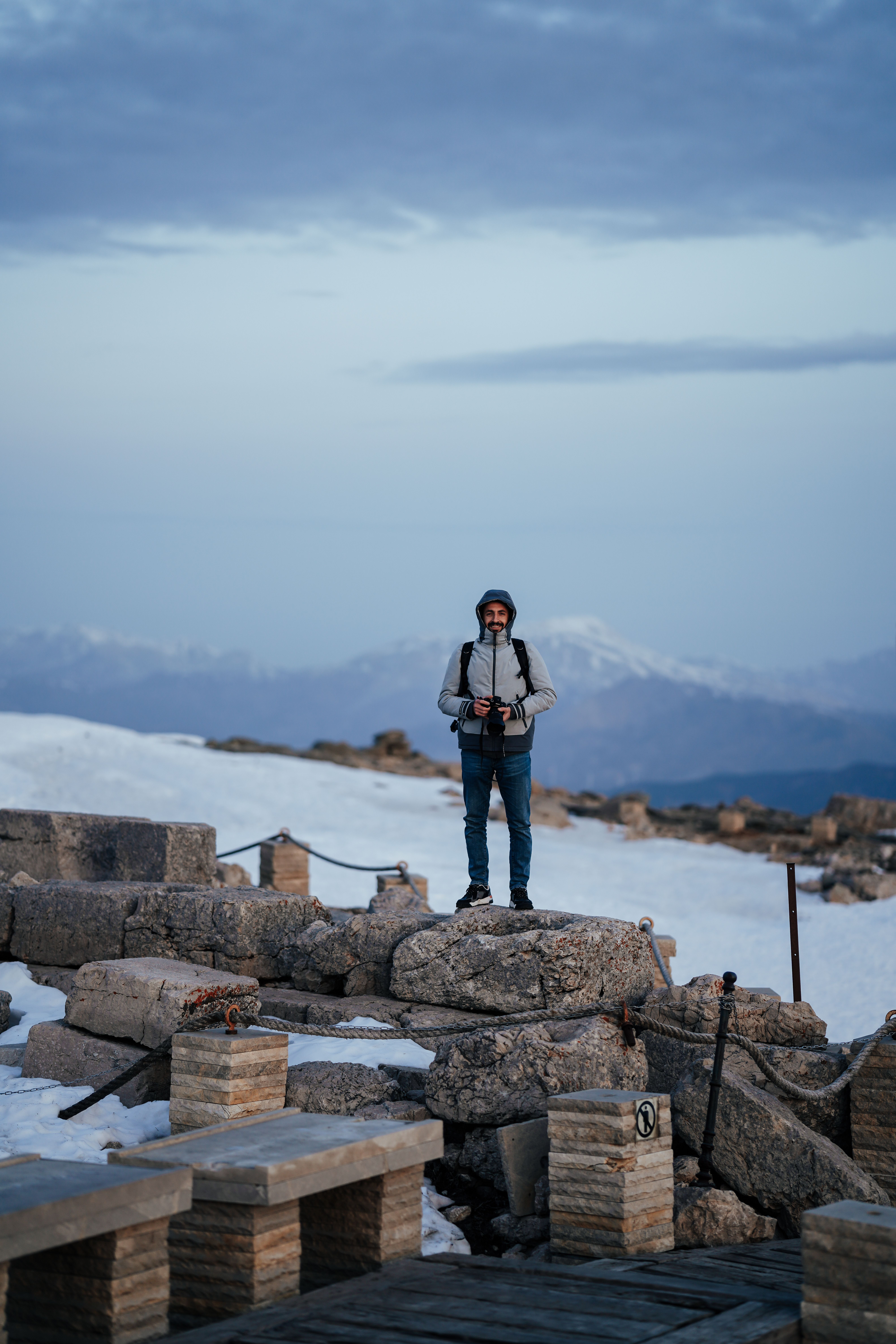 Traveler Exploring Snowy Mountain Landscape · Free Stock Photo