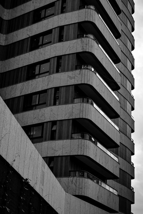 Free Black and white modern building facade in Belo Horizonte, Brazil with curved balconies. Stock Photo