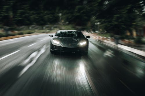 Grey Coupe on Road