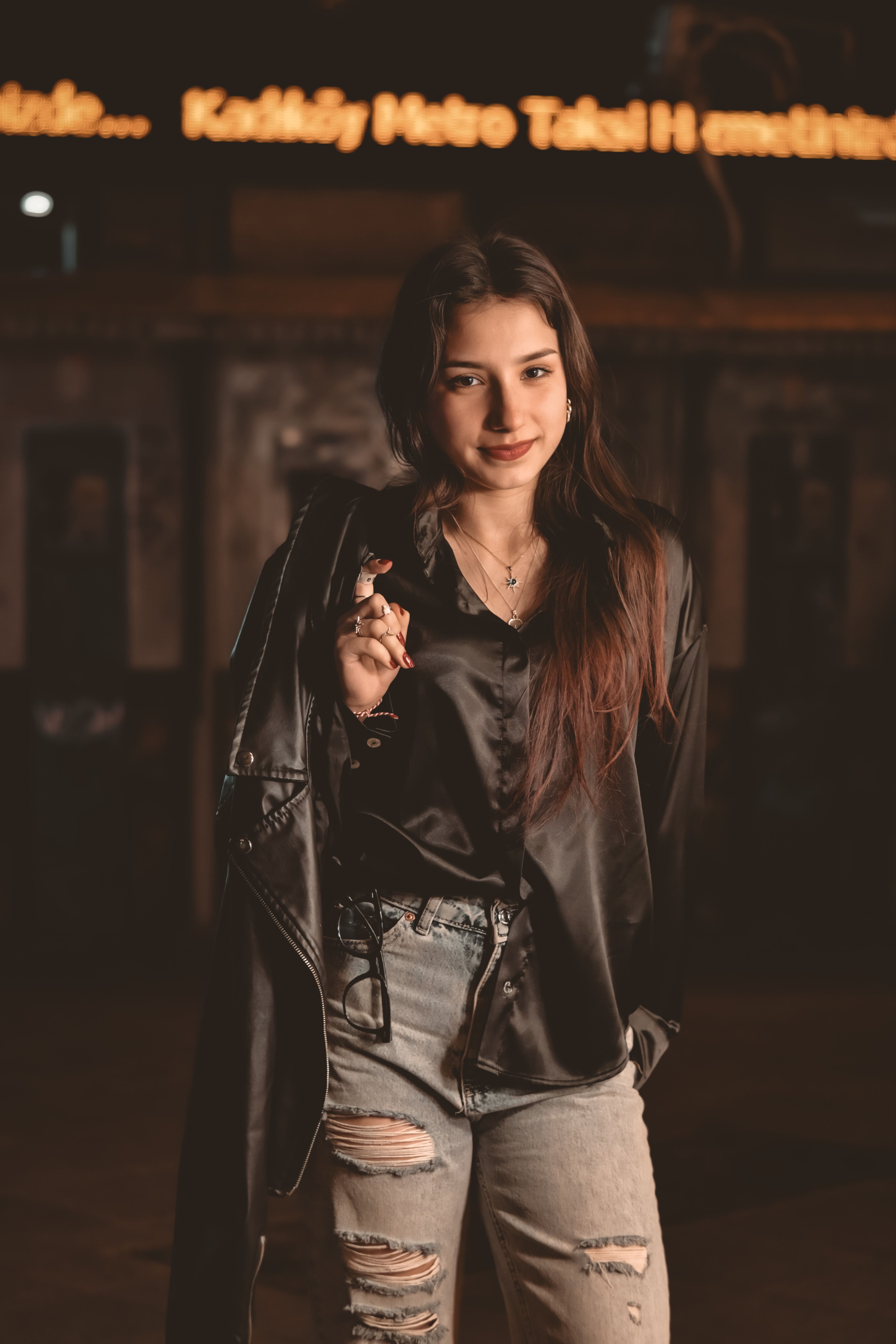 Stylish Young Woman Posing at Night Outdoors · Free Stock Photo