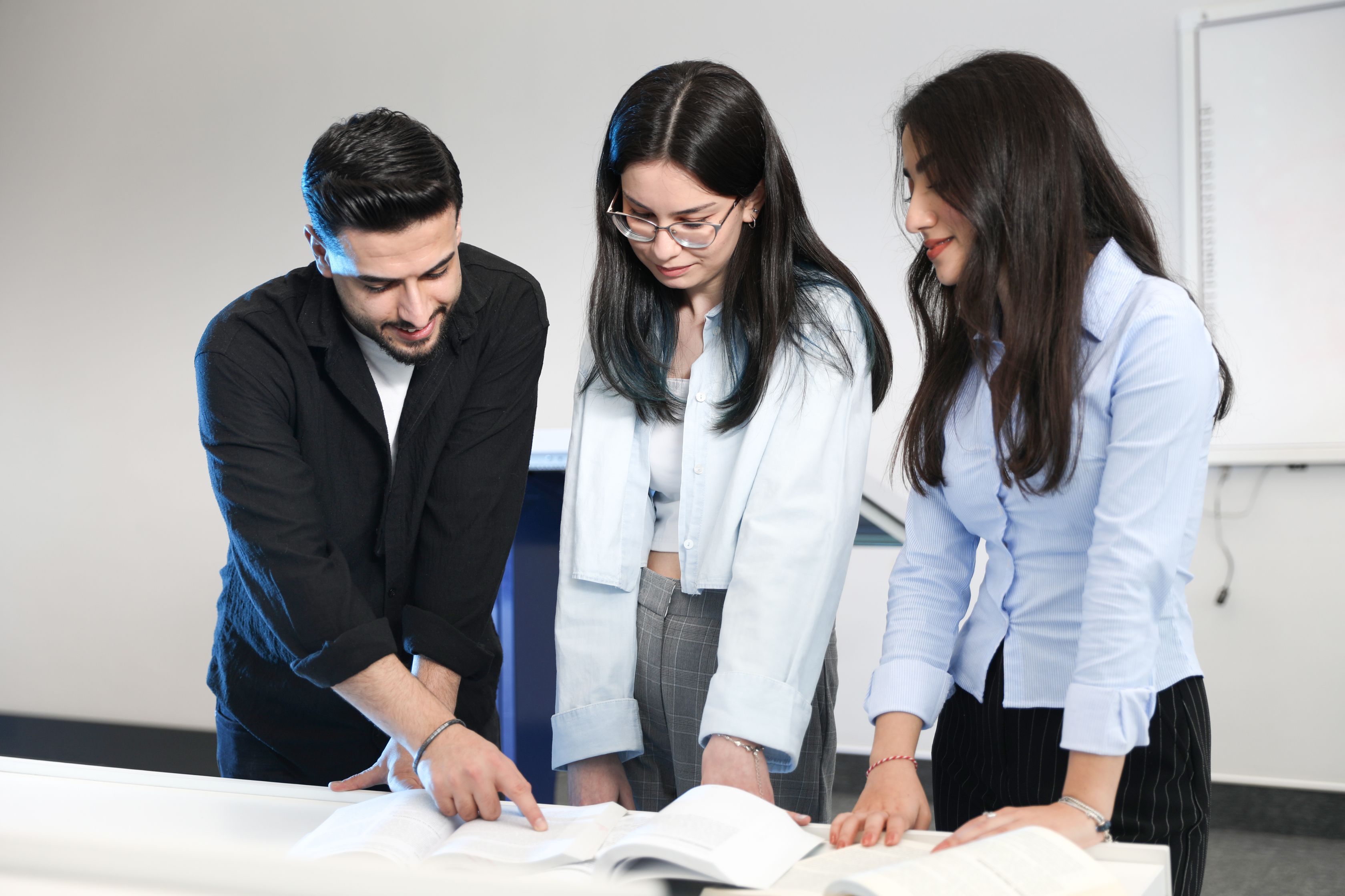 Young Professionals Collaborating in Office Setting · Free Stock Photo