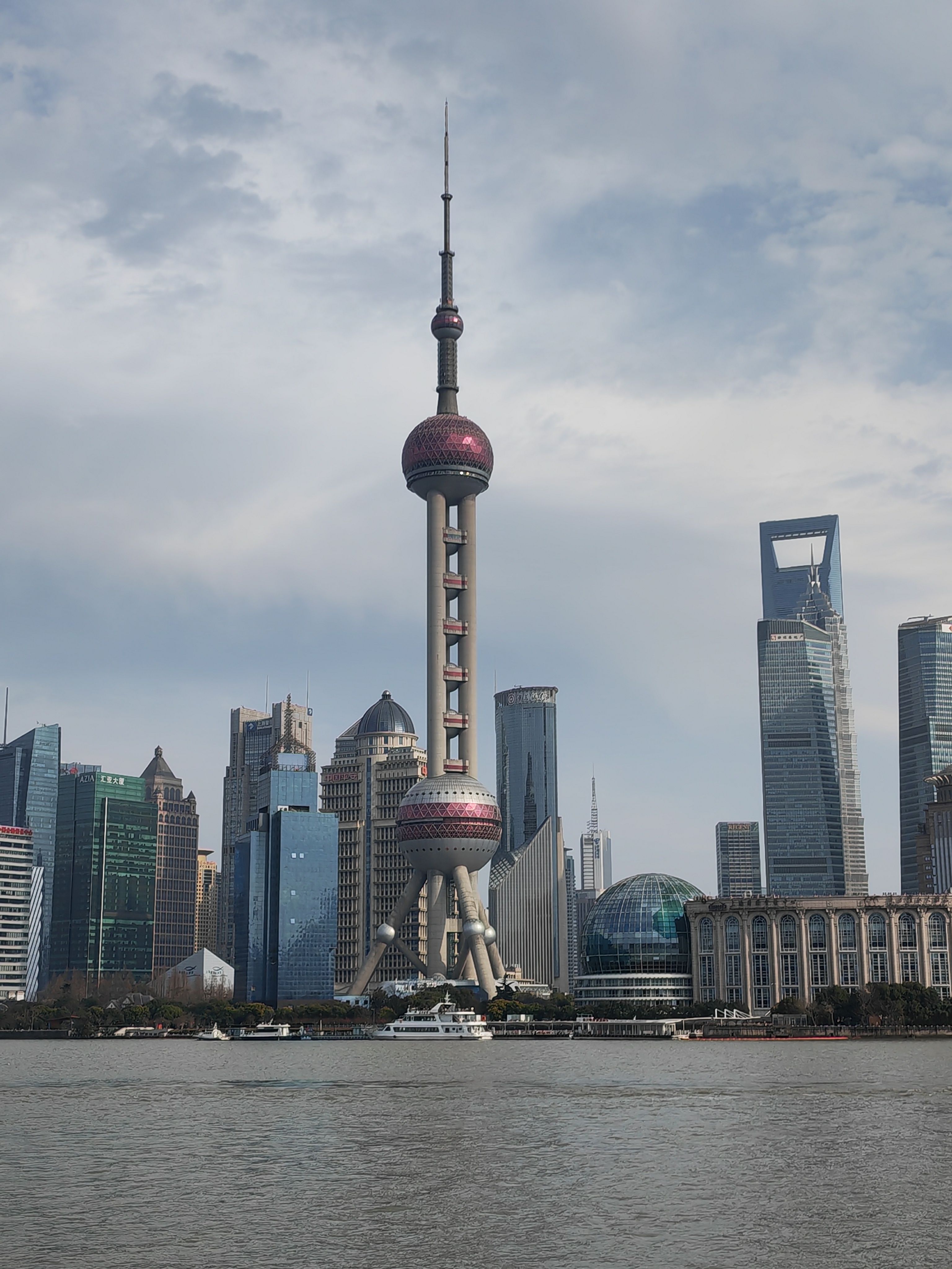 Scenic view of Shanghai's skyline featuring the iconic Oriental Pearl Tower.