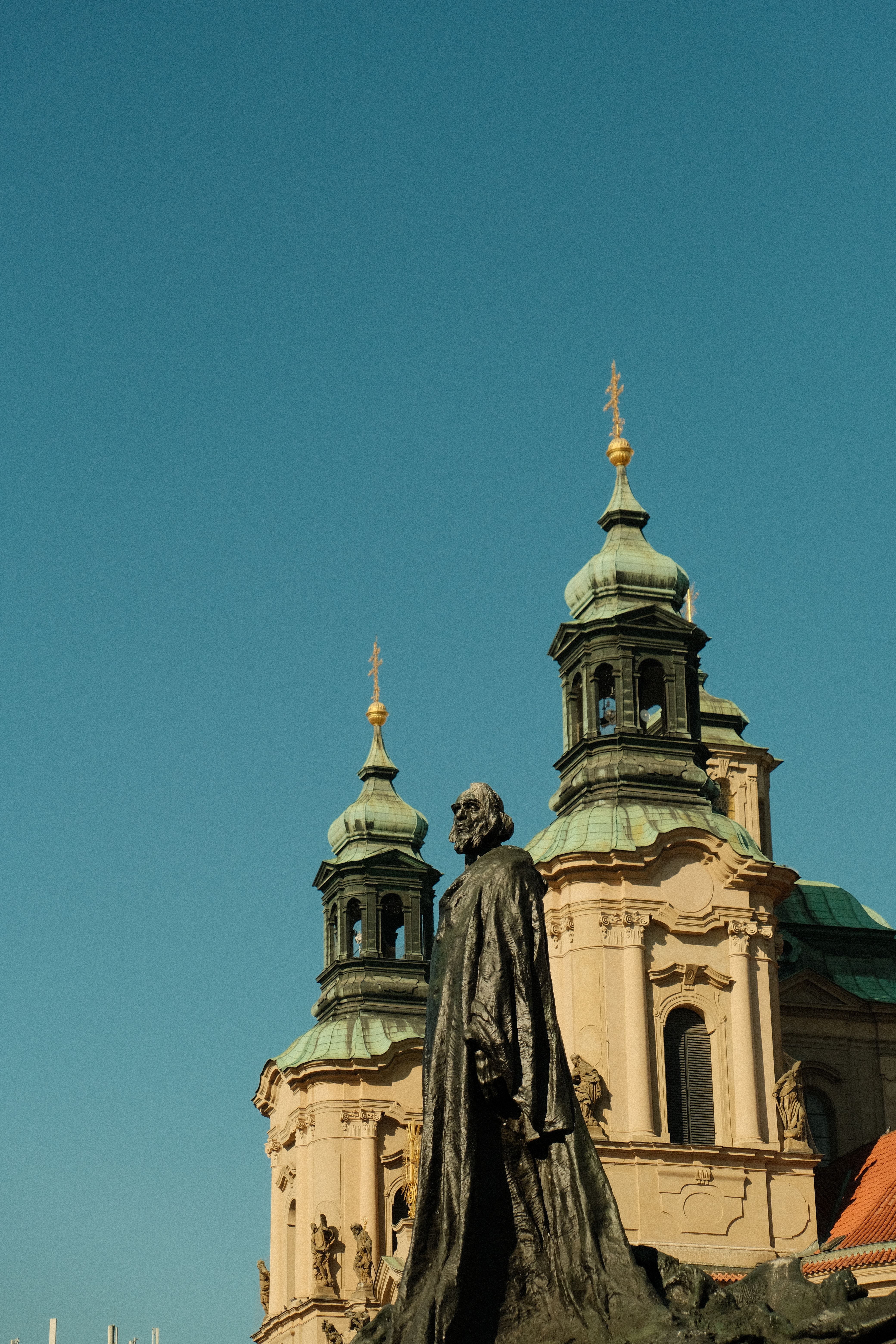 Historic European Architecture with Monument · Free Stock Photo