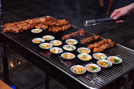 Tasty street food BBQ with savory skewers and grilled eggs. Perfect culinary delight.