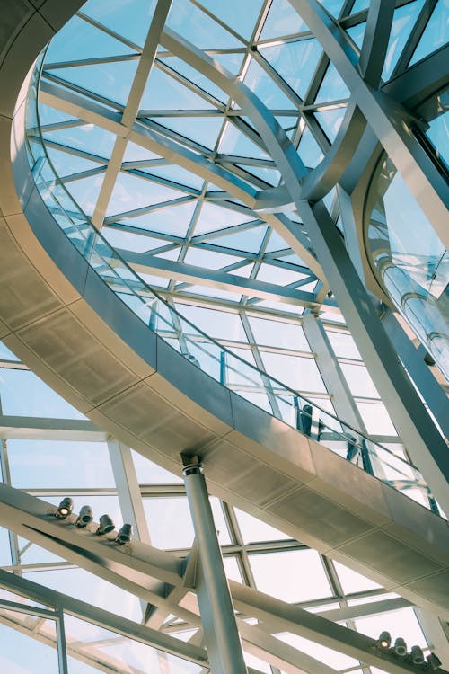 Low Angle Shot Of A Modern Building Design Of Steel And Glass Panels