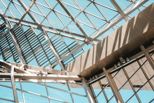 Free Low Angle Shot From inside Of A Modern Building Made Of Steel And Glass Panels Stock Photo
