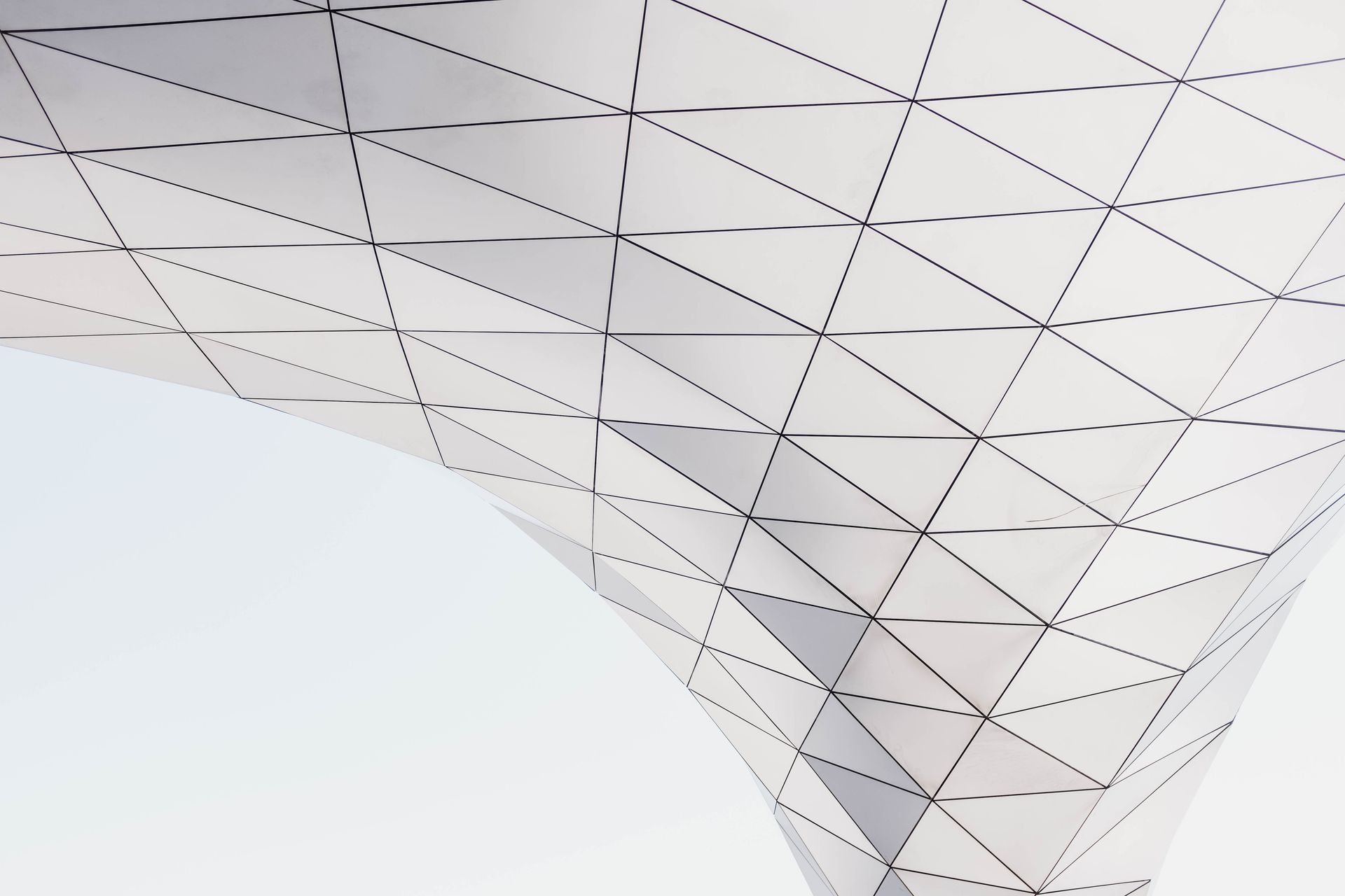 Low Angle Shot Of A Modern Structure With Geometric Design
