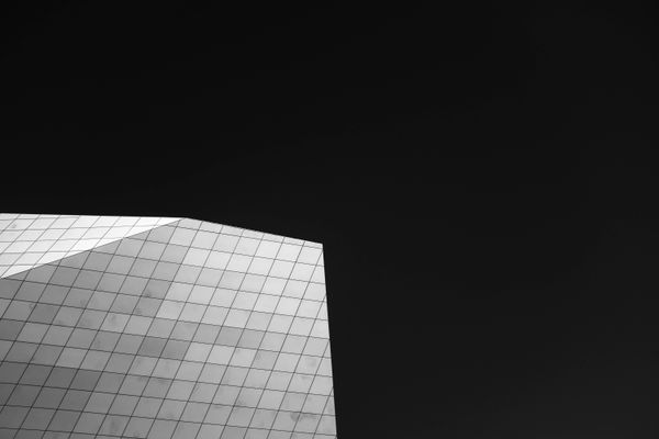 Glass block cutting into a black sky — Adrien Olichon on Pexels